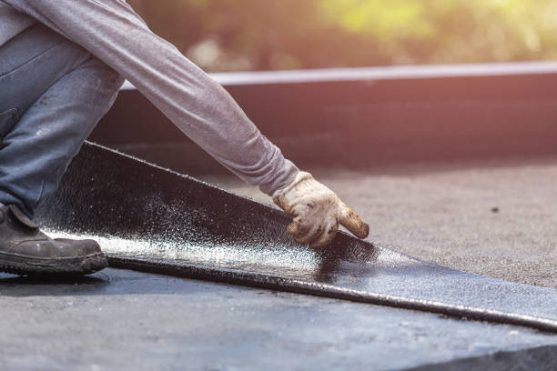 Professional Waterproofing technician working in Riverside, MI
